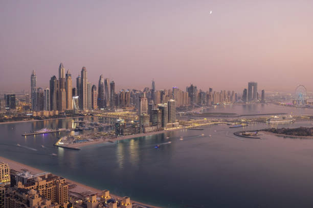 Dubai's skyline at dusk with prominent skyscrapers, illustrating an alluring destination for freelancers.